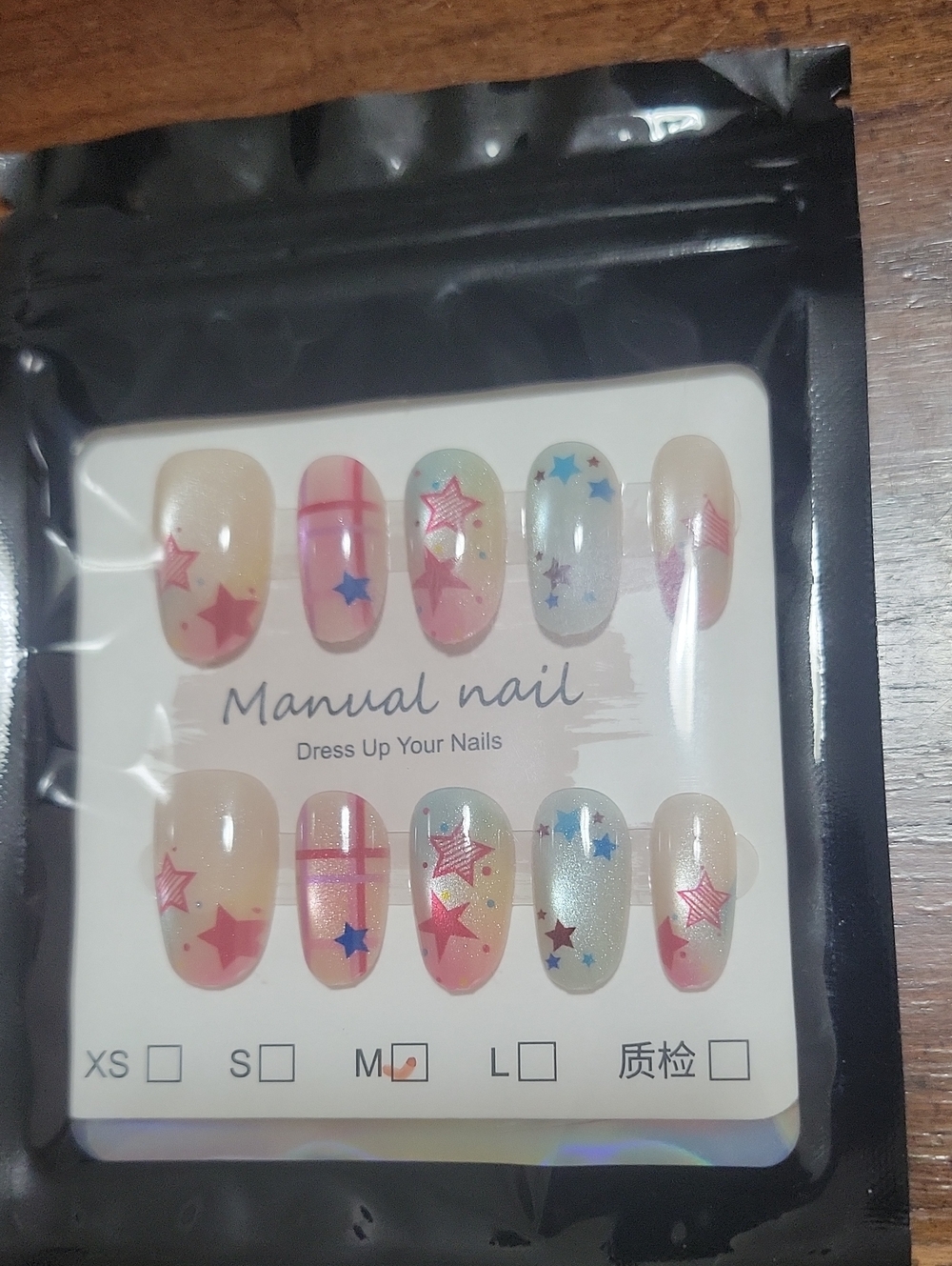 Manual nail press on nails